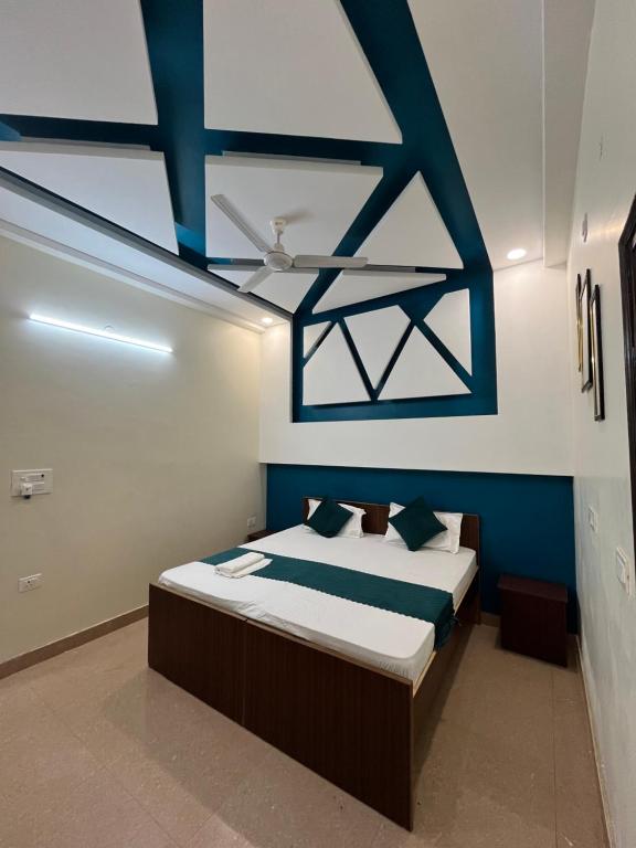 Postel nebo postele na pokoji v ubytování Hotel Silver Inn