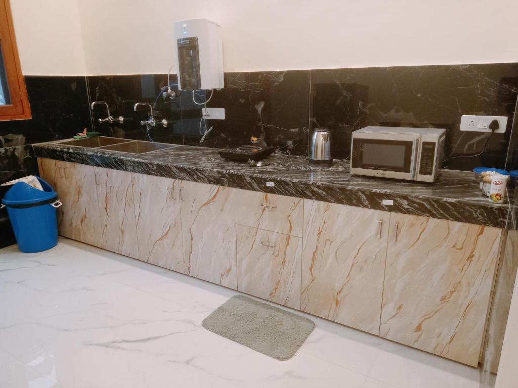 Una cocina o cocineta en Anand Kunj