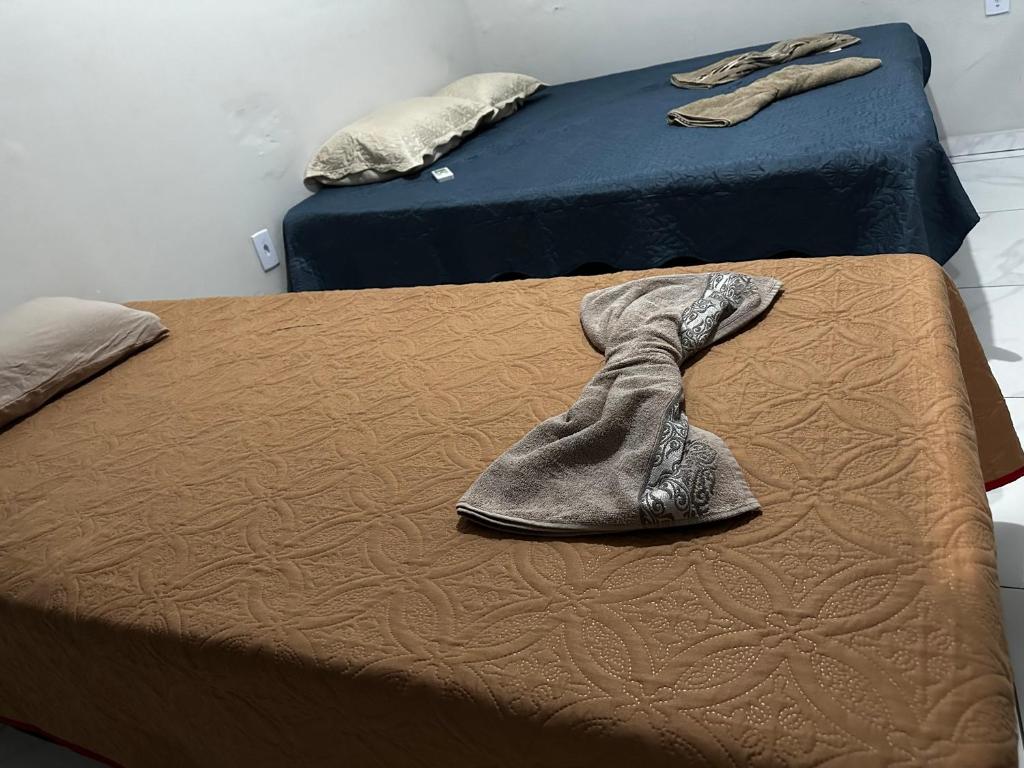 Postel nebo postele na pokoji v ubytování Pousada Aconchego Diamantina