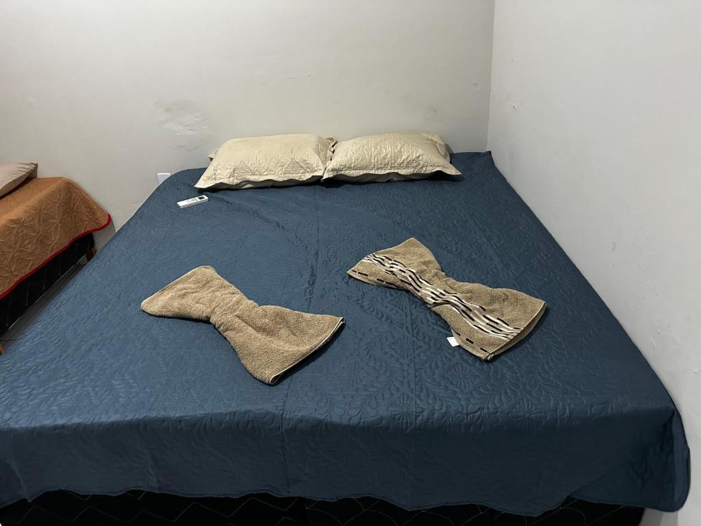 Postel nebo postele na pokoji v ubytování Pousada Aconchego Diamantina