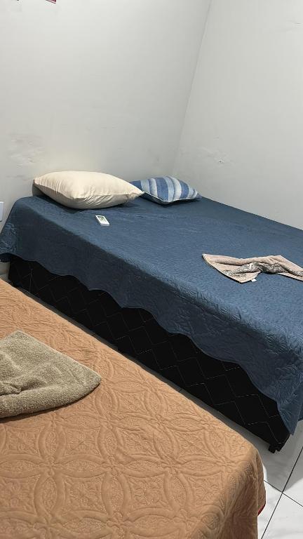 Postel nebo postele na pokoji v ubytování Pousada Aconchego Diamantina