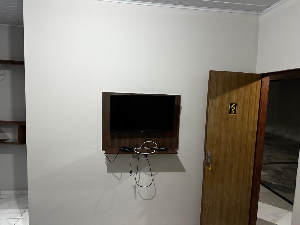 TV a/nebo společenská místnost v ubytování Pousada Aconchego Diamantina