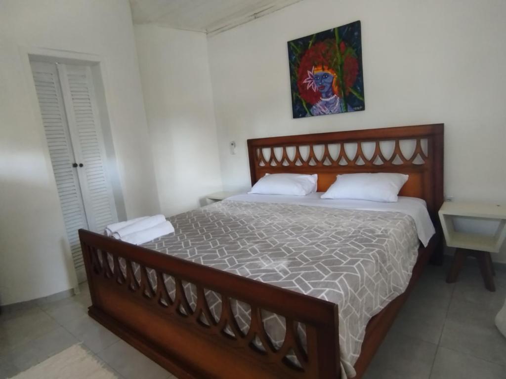 En eller flere senge i et værelse på La Peregrina - Bangalô Superior