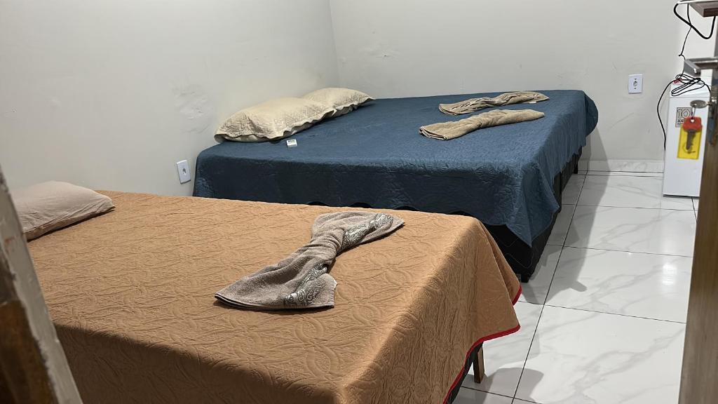 Postel nebo postele na pokoji v ubytování Pousada Aconchego Diamantina