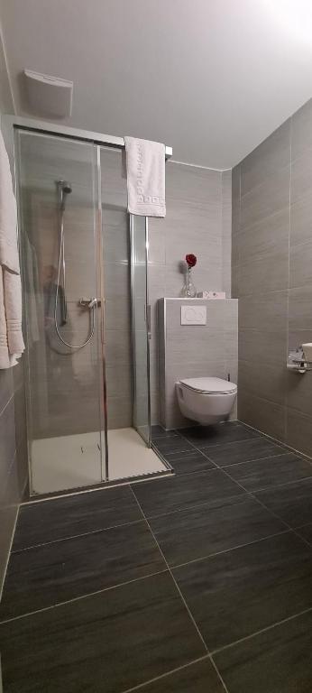 Koupelna v ubytování Hotel Garni