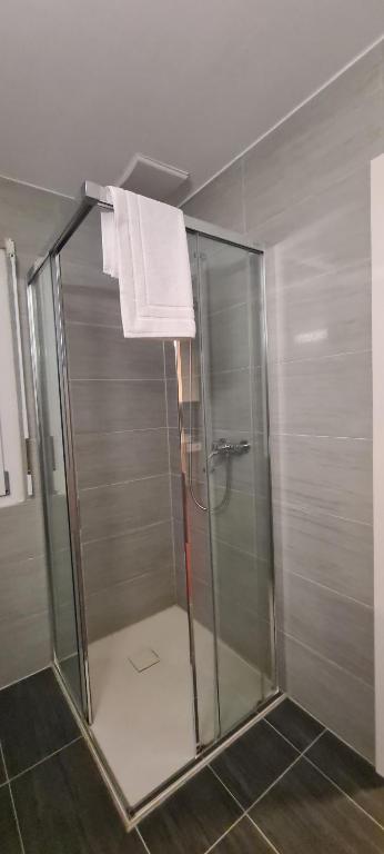 Koupelna v ubytování Hotel Garni
