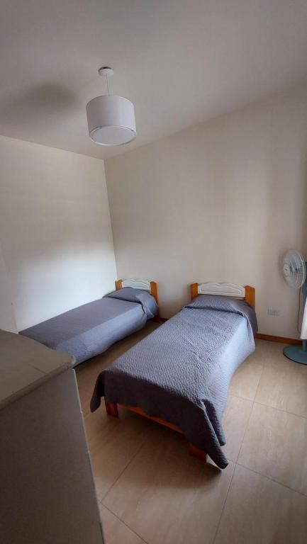 Ένα ή περισσότερα κρεβάτια σε δωμάτιο στο "La Casita" en San Clemente