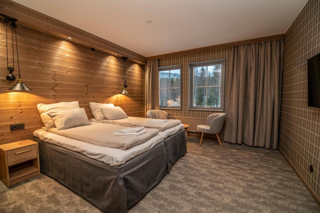 Postel nebo postele na pokoji v ubytování Matarengi Lodge