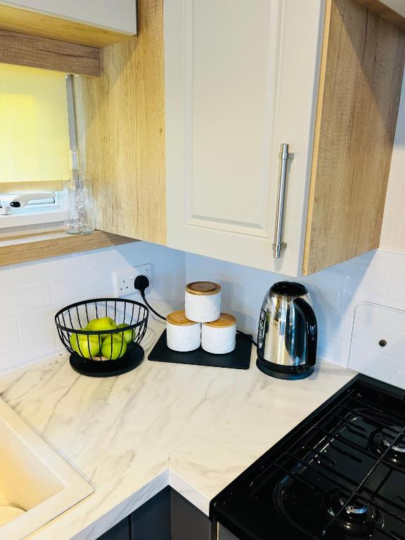 Kuchyň nebo kuchyňský kout v ubytování Luxury Cozy Caravan at Seaton Sands