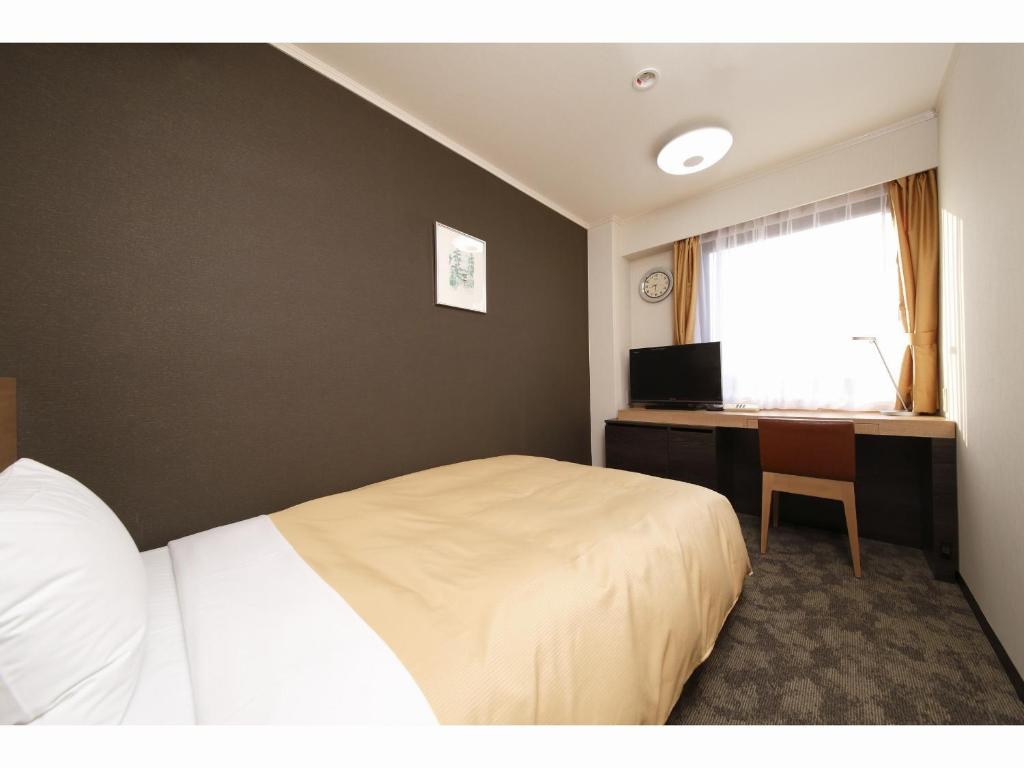 TV a/nebo společenská místnost v ubytování Hotel OBANA
