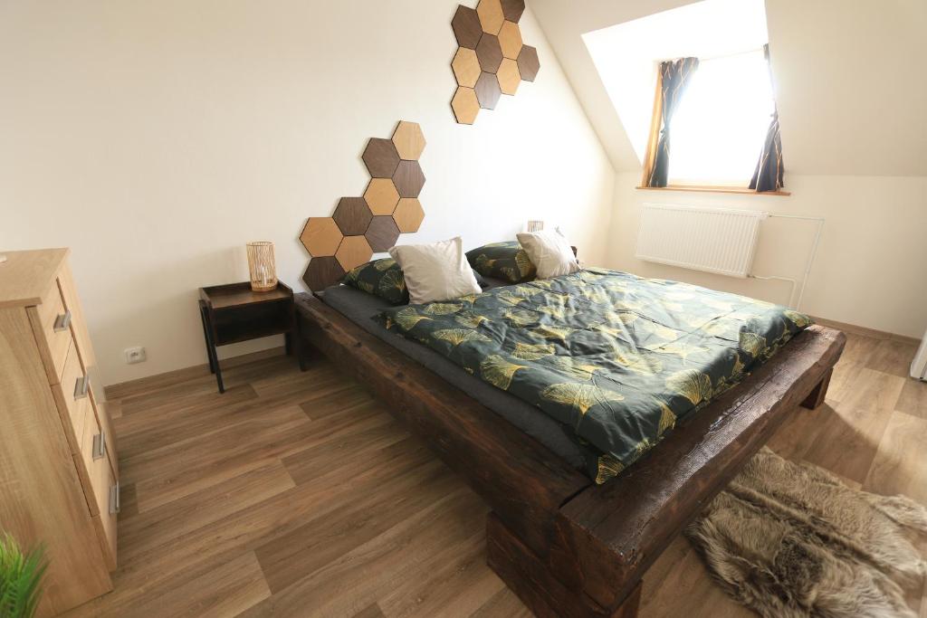 Postel nebo postele na pokoji v ubytování ApaHouse