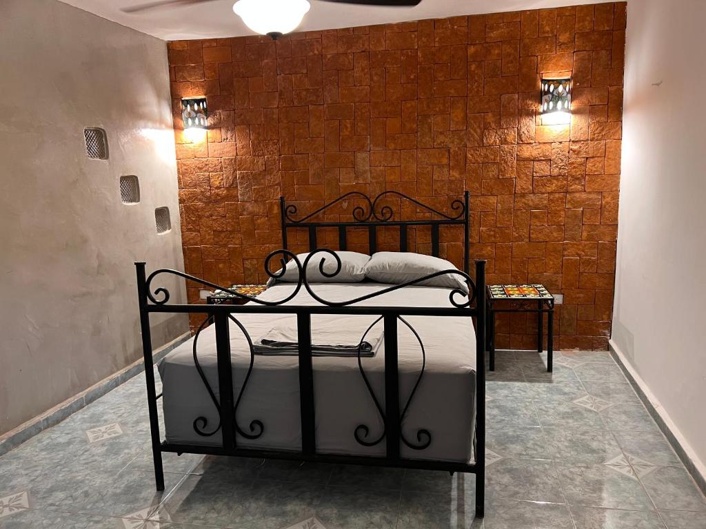 Ліжко або ліжка в номері Hostal Patio Nómada