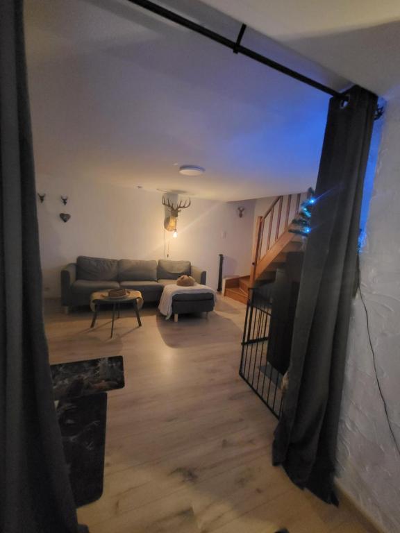 Postel nebo postele na pokoji v ubytování Le Grand Cerf gîte citadin