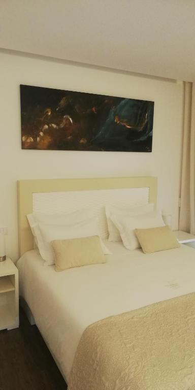 Postel nebo postele na pokoji v ubytování CANTINHO D'AVÓ - Apúlia