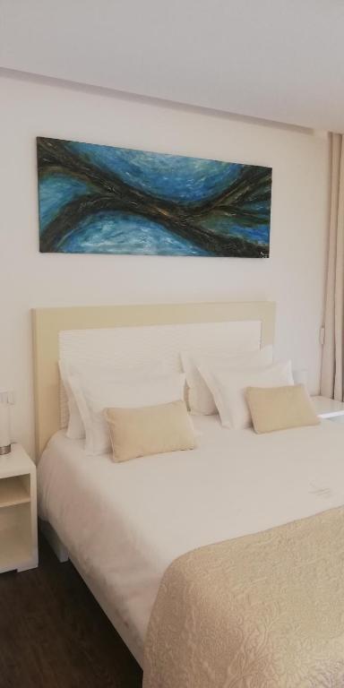 Postel nebo postele na pokoji v ubytování CANTINHO D'AVÓ - Apúlia
