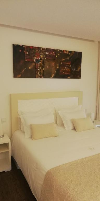 Postel nebo postele na pokoji v ubytování CANTINHO D'AVÓ - Apúlia