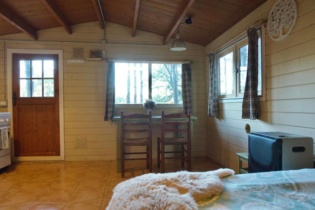 Postel nebo postele na pokoji v ubytování Cabañita de madera en Mas Coguleras
