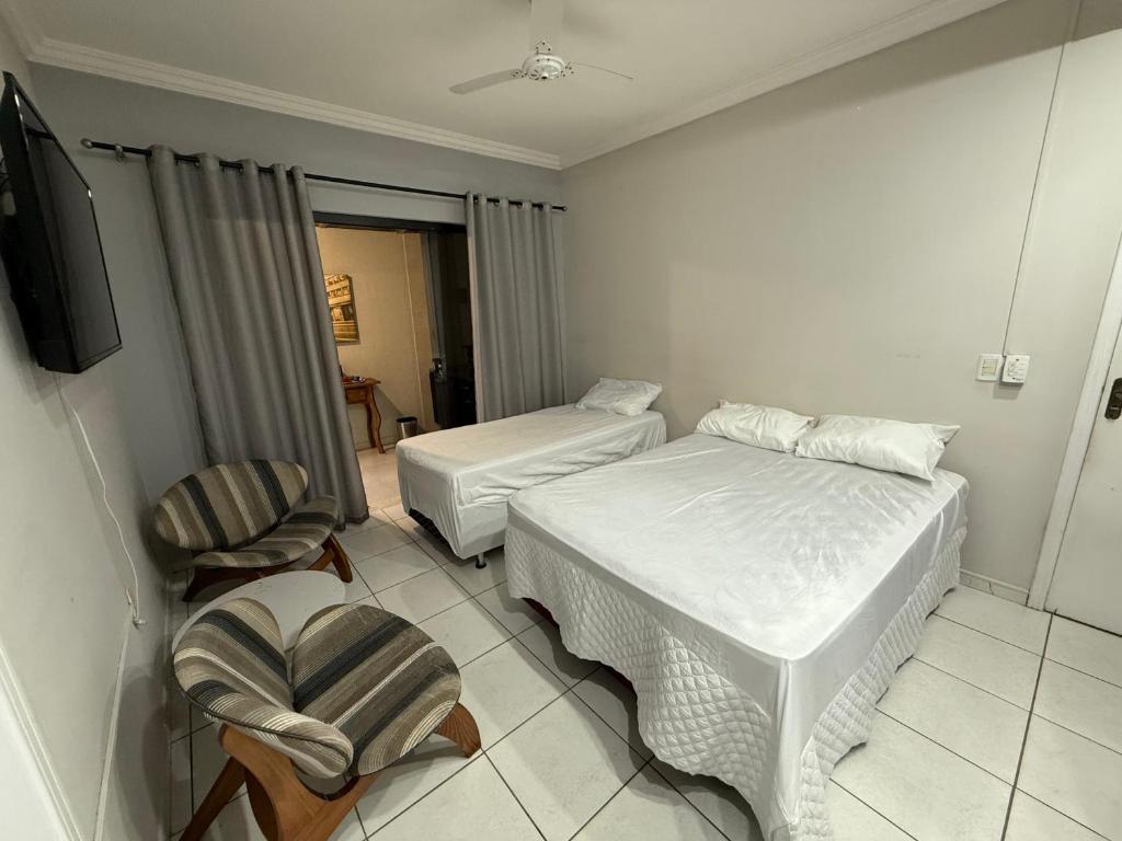 Ένα ή περισσότερα κρεβάτια σε δωμάτιο στο Loft BC ESTÚDIO Centro