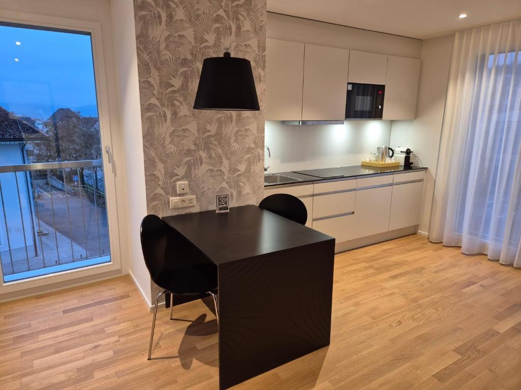Kuchyň nebo kuchyňský kout v ubytování CENTRINO Apartments