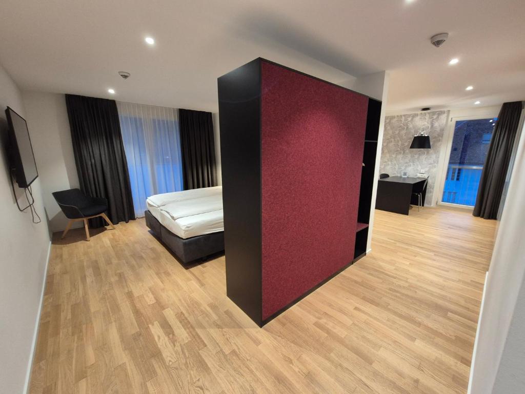 Postel nebo postele na pokoji v ubytování CENTRINO Apartments