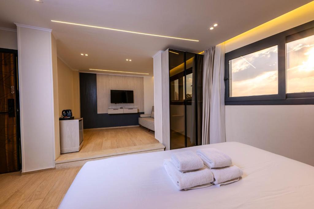 Postel nebo postele na pokoji v ubytování Remal Pyramids Hotel