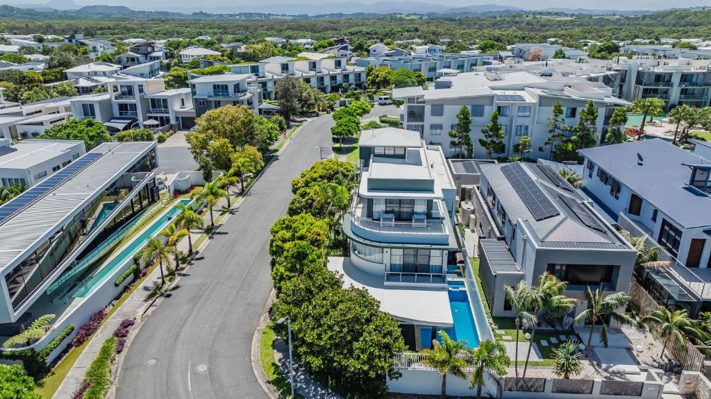 an aerial view of a city with houses at Sandcastles in Casuarina