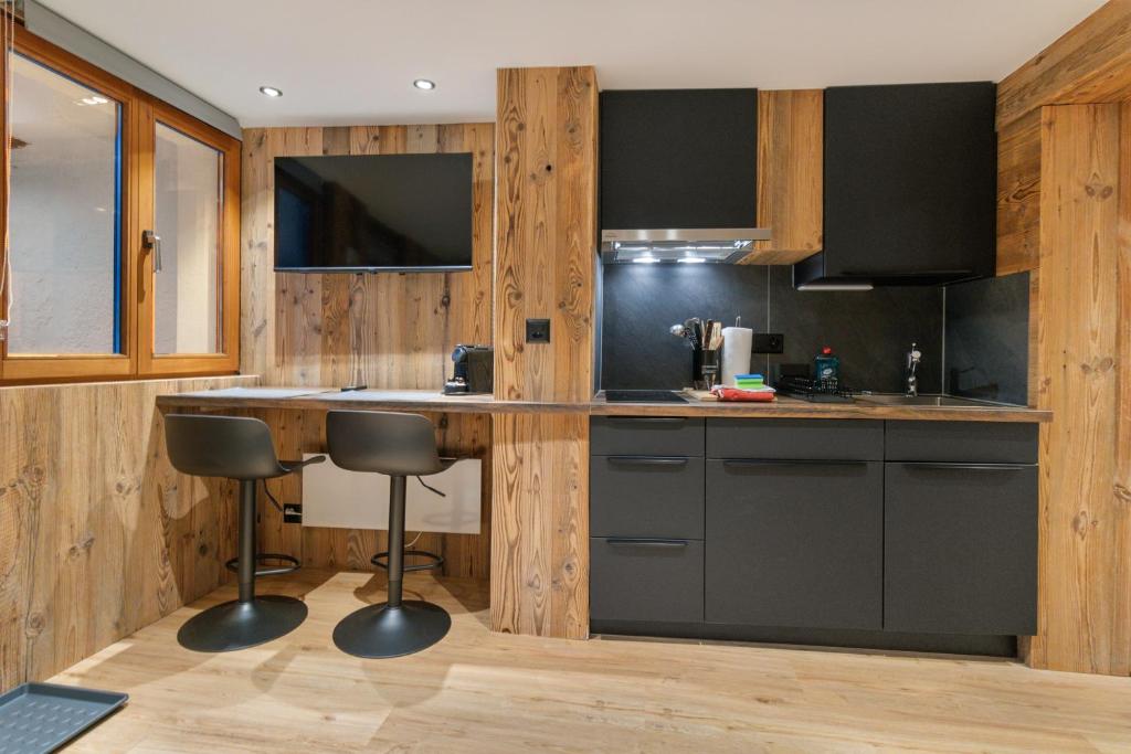 Kuchyň nebo kuchyňský kout v ubytování Studio rénové au centre de Saas-Fee