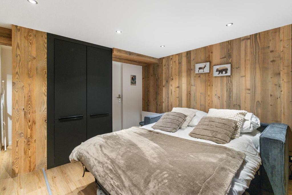 Postel nebo postele na pokoji v ubytování Studio rénové au centre de Saas-Fee