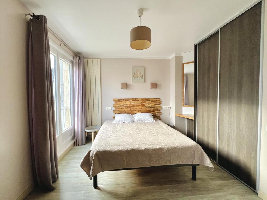 Postel nebo postele na pokoji v ubytování Hôtel Le Littoral - Berck sur Mer