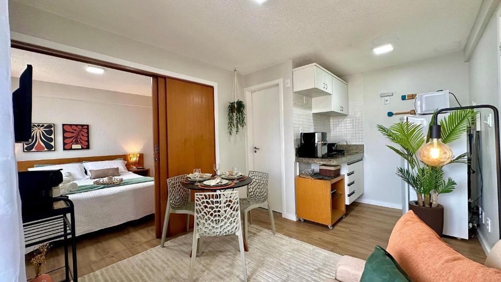 Η κουζίνα ή μικρή κουζίνα στο (1002) Flat na Praia da Ponta da Areia