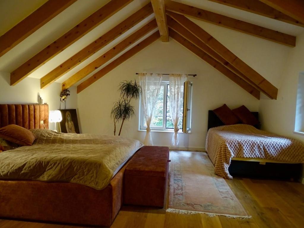 Postel nebo postele na pokoji v ubytování LYNX HOUSE