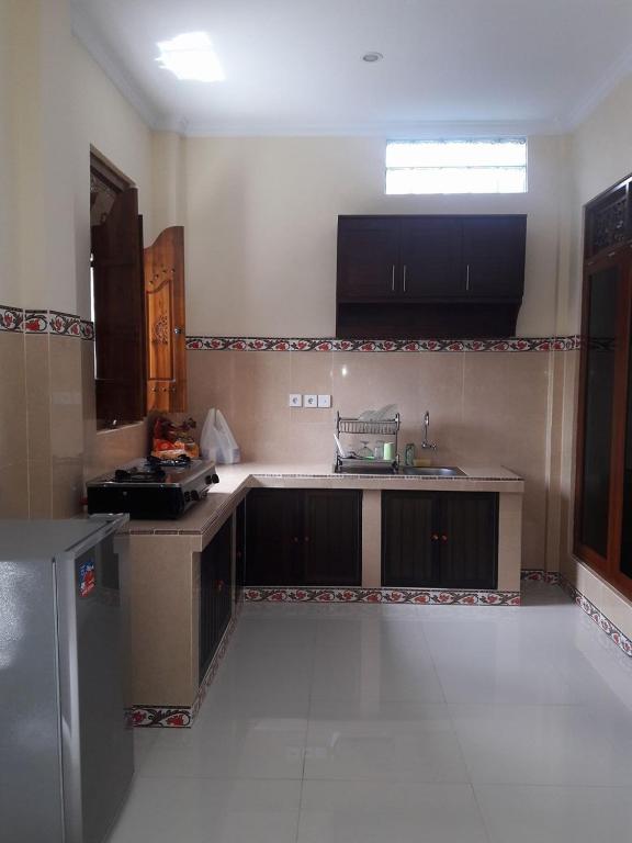 Kuchyň nebo kuchyňský kout v ubytování Lucky Family Villa