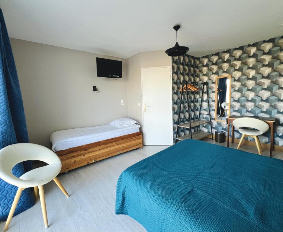 Postel nebo postele na pokoji v ubytování Hôtel Le Littoral - Berck sur Mer