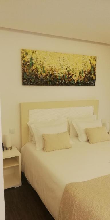 Postel nebo postele na pokoji v ubytování CANTINHO D'AVÓ - Apúlia