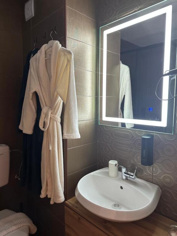 Koupelna v ubytování Apartman Viktorija