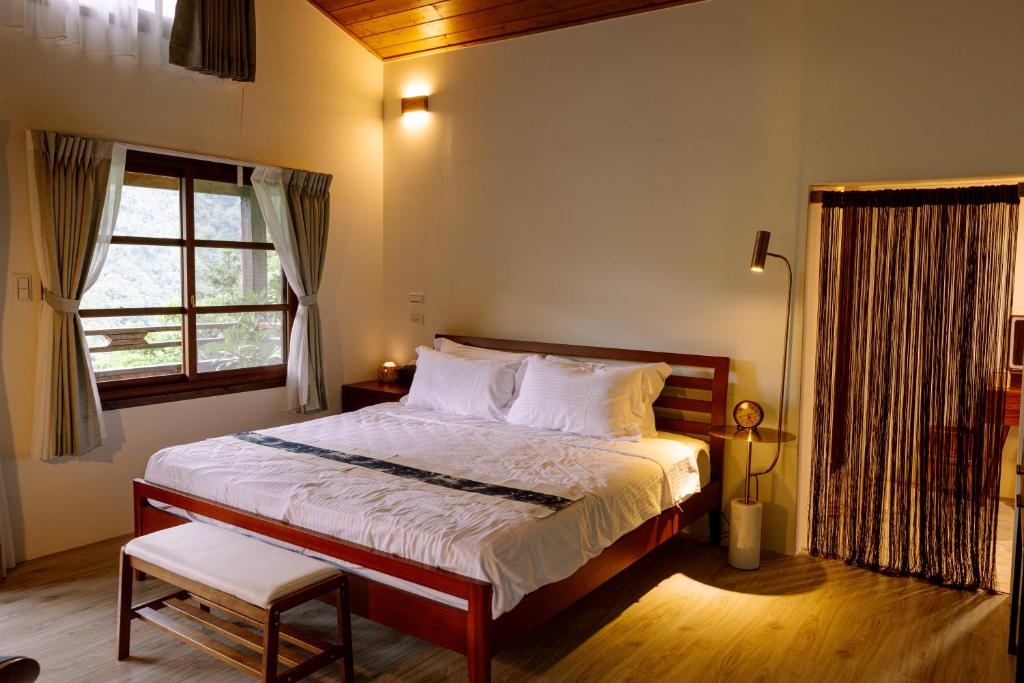 Postel nebo postele na pokoji v ubytování Shan Xing Ji Ye Homestay