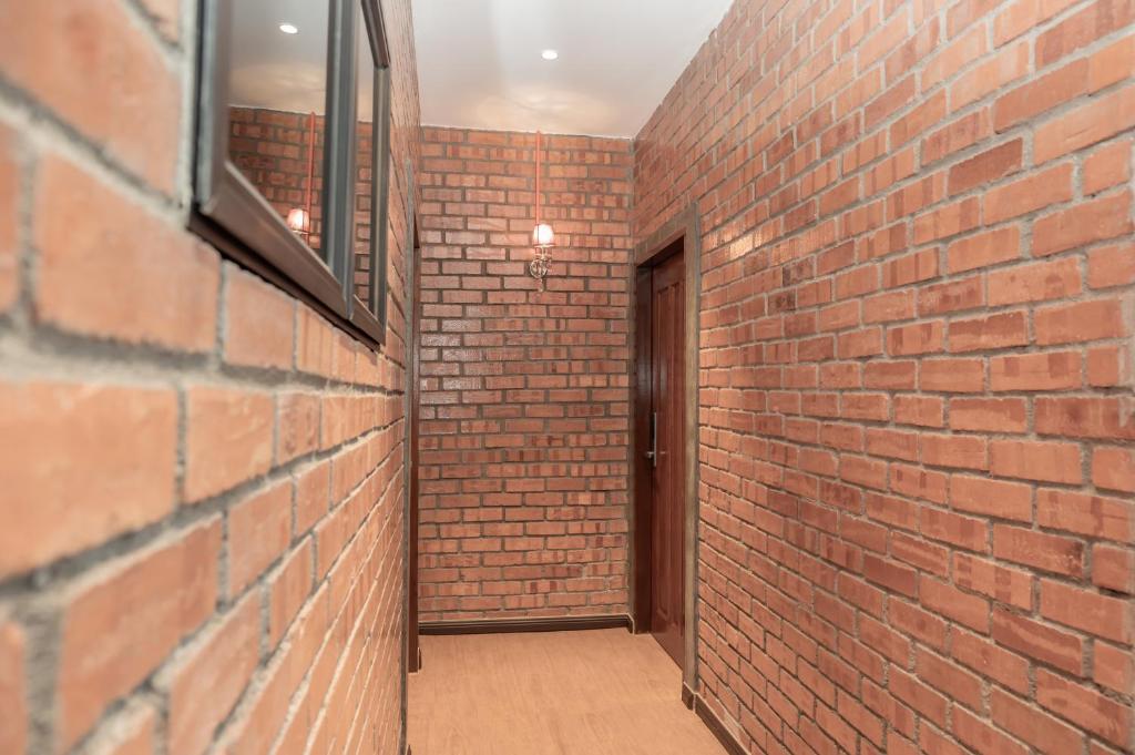 Fotografie z fotogalerie ubytování Bricks Guesthouse v destinaci Tanah Rata