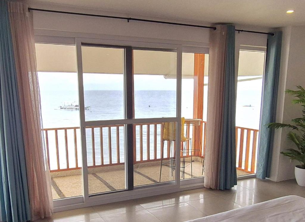 Balkón nebo terasa v ubytování Quo Vadis Dive Resort