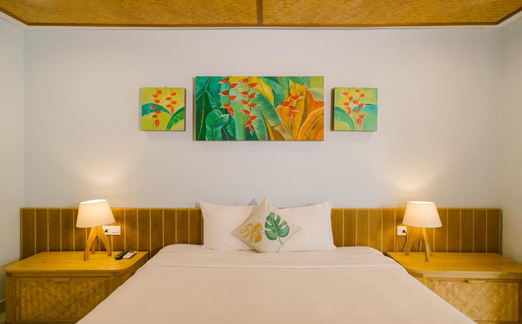 Postel nebo postele na pokoji v ubytování Villa De Campagne Hoi An