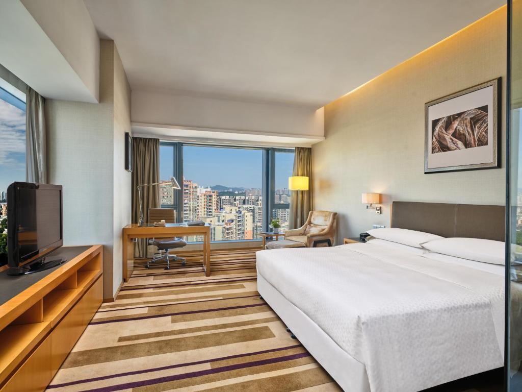 Postel nebo postele na pokoji v ubytování Four Points by Sheraton Guangzhou, Tianhe