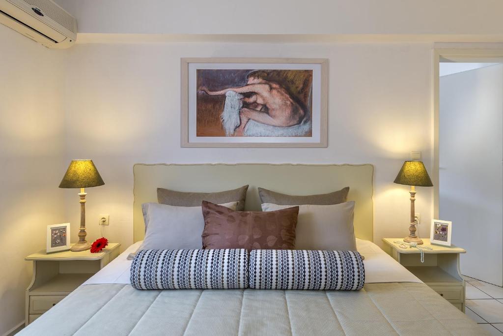 Postel nebo postele na pokoji v ubytování Agrimia Holiday Apartments