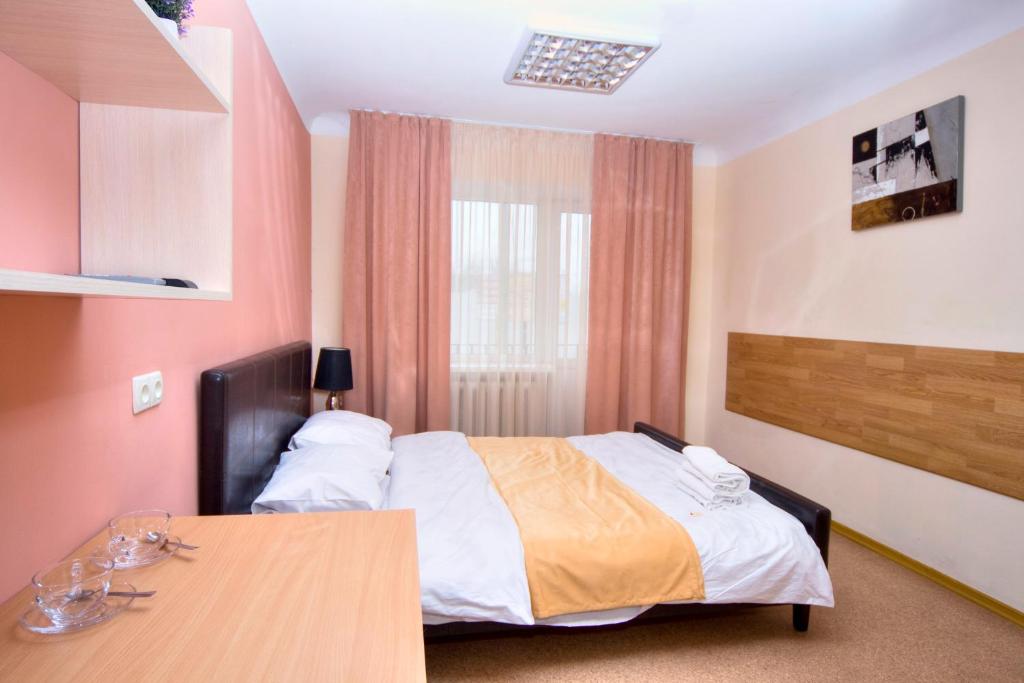 Voodi või voodid majutusasutuse Hostel Podolski Plus toas