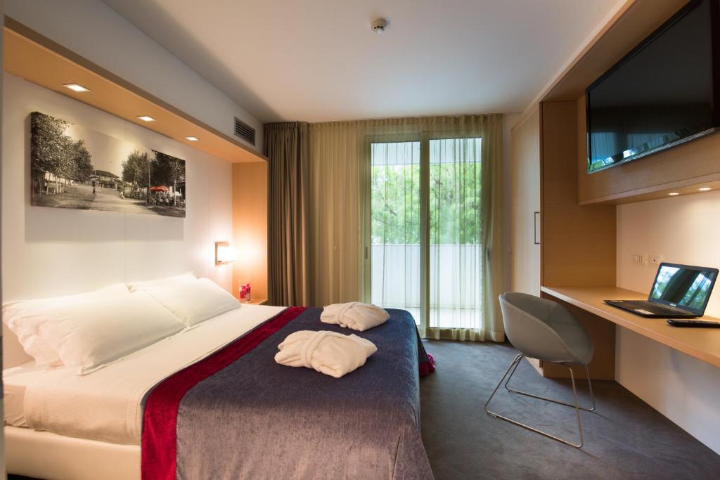 Posteľ alebo postele v izbe v ubytovaní Hotel Florida