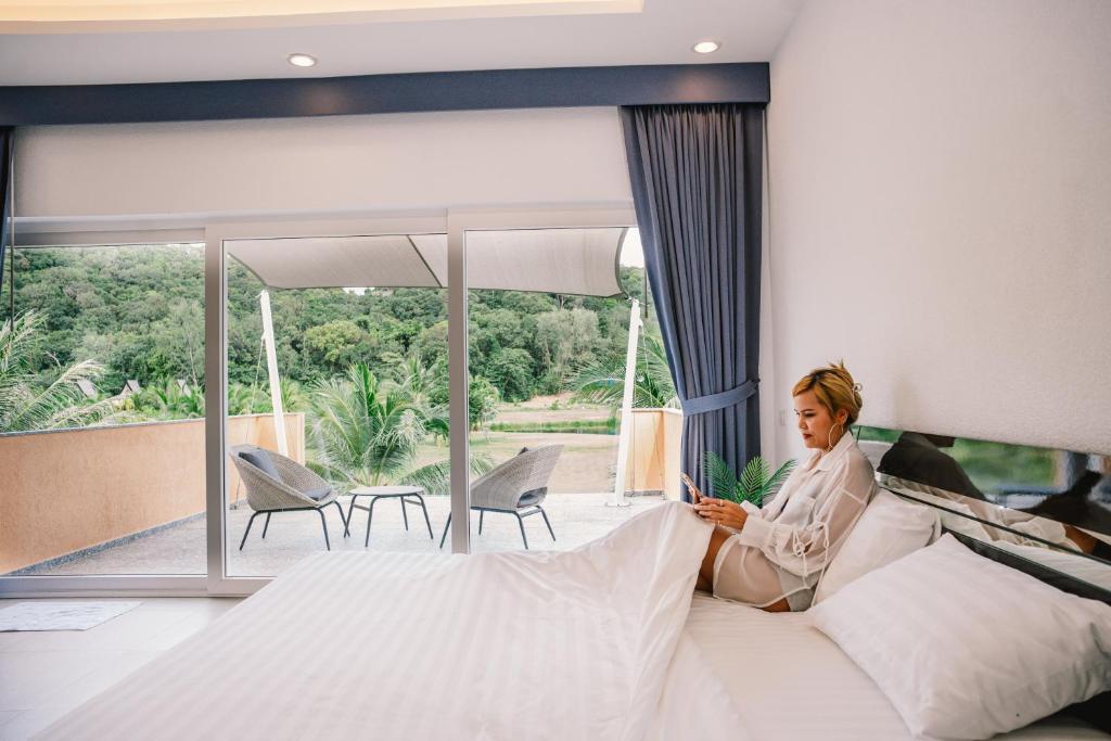 Postel nebo postele na pokoji v ubytování Bikini Villas Koh Chang