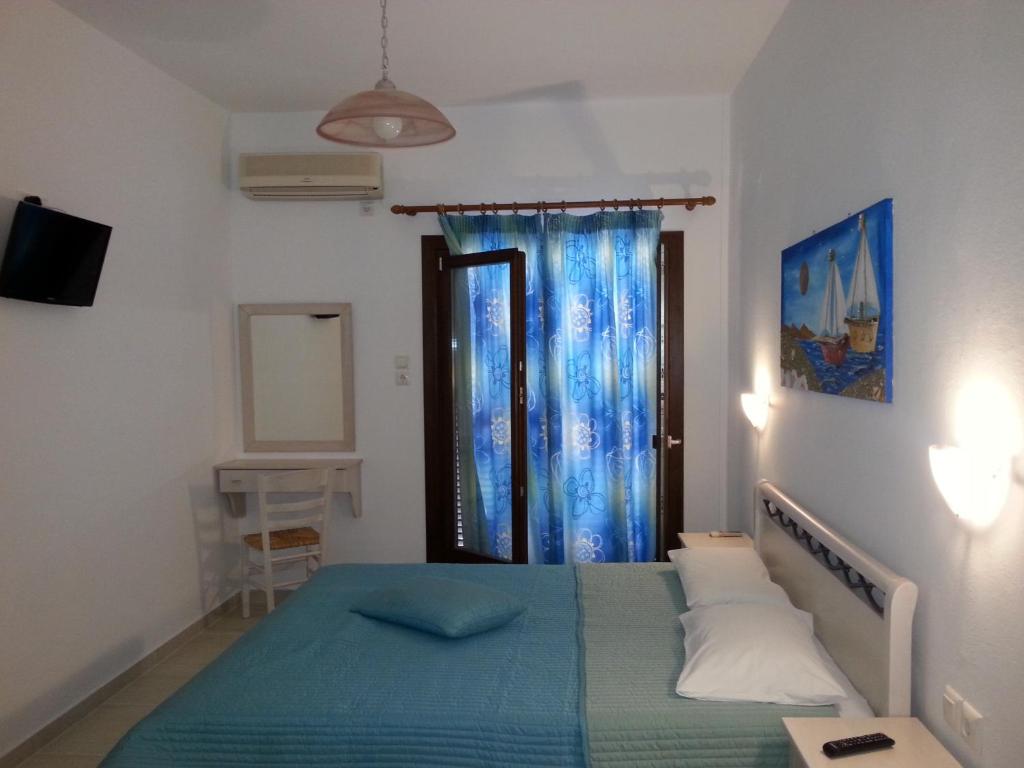 Posteľ alebo postele v izbe v ubytovaní Guesthouse Irene