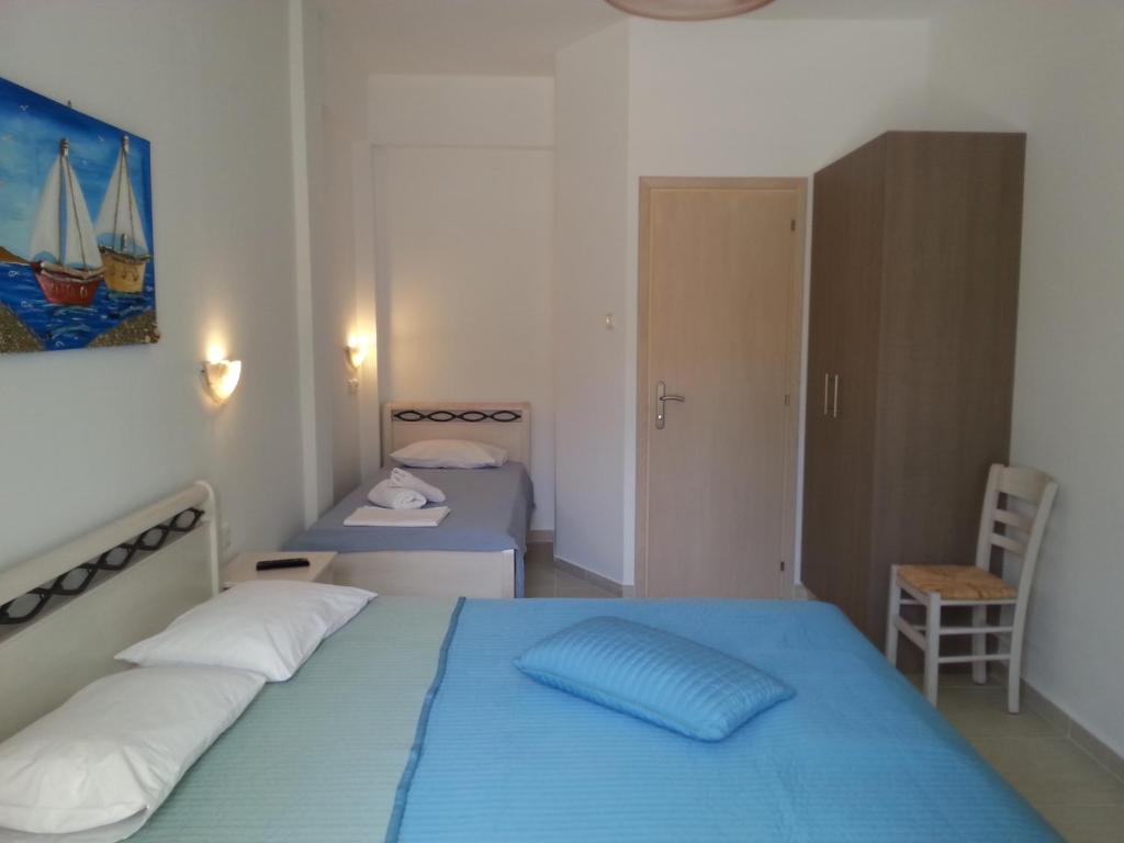 Posteľ alebo postele v izbe v ubytovaní Guesthouse Irene