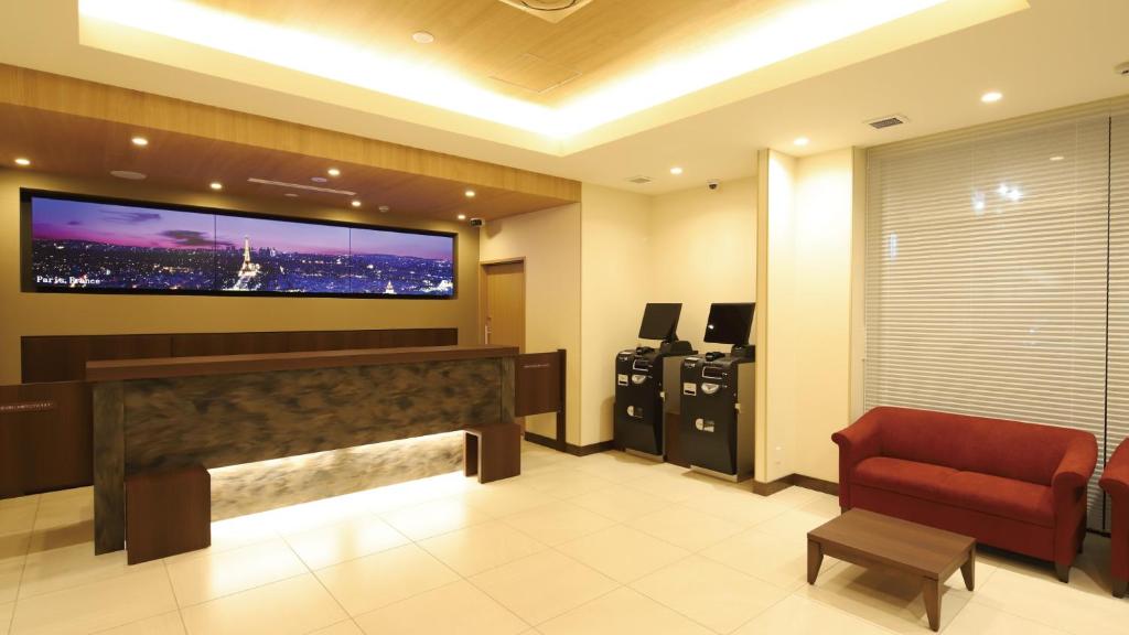 TV a/nebo společenská místnost v ubytování AB Hotel Konan