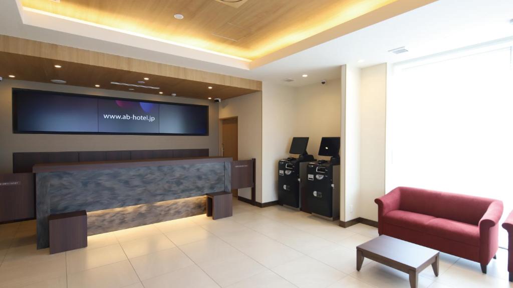 TV a/nebo společenská místnost v ubytování AB Hotel Konan