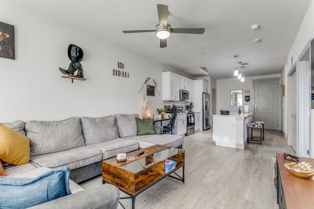 a living room with a couch and a table at San Antonio TX Condo on Riverwalk w King Ste,Pets in San Antonio