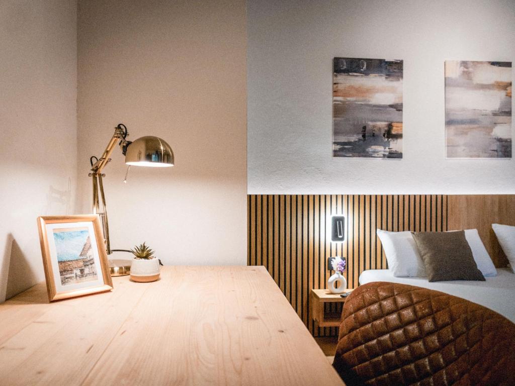 Posteľ alebo postele v izbe v ubytovaní Bergblick Apartment in Zentrumsnähe mit Garage